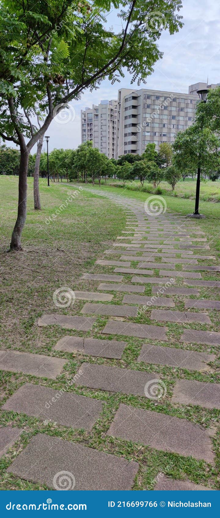 Stone Floor Road in Front of Nice View Apartments Stock Photo Image