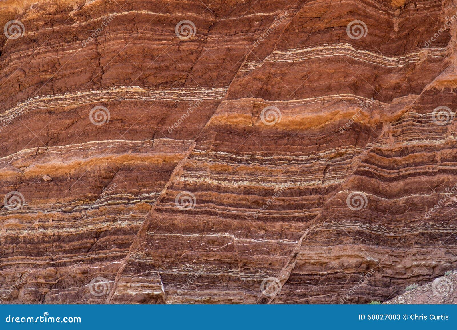 stone formation showing fault lines