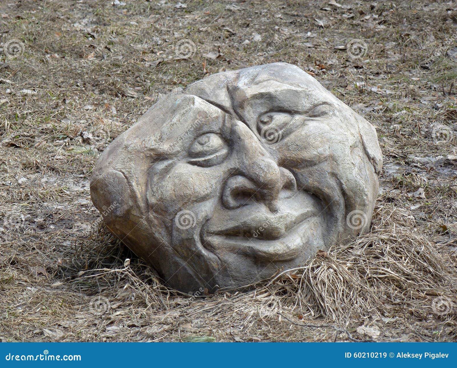Stone head stock image. Image of detail, grass, sculpture 60210219