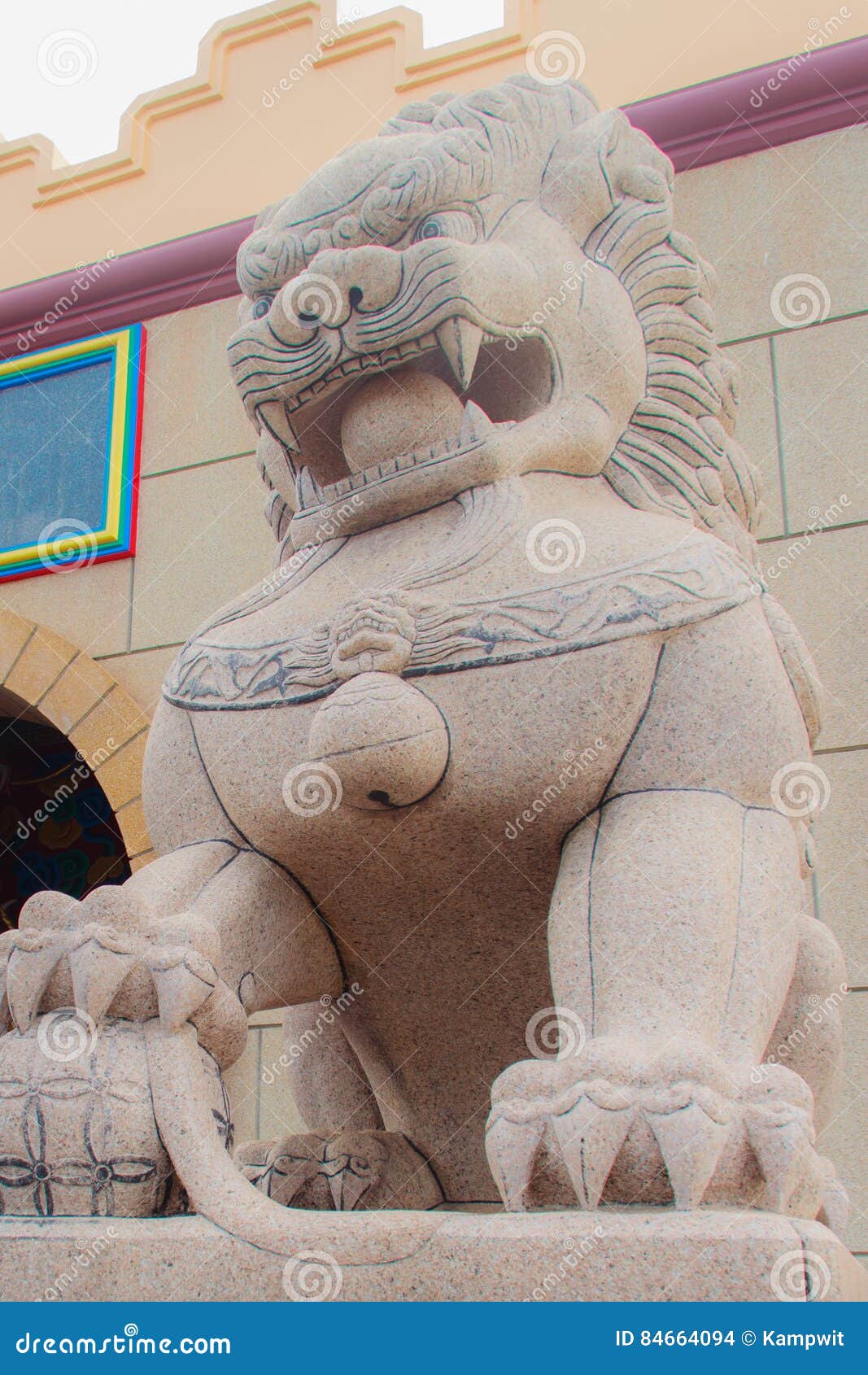 stone lion guardian statue at the entrance gate of anek kusala sala viharn sien, thai-chinese temple in pattaya, thailand. it wa