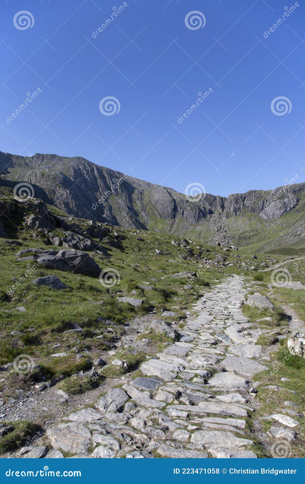 stone mountain path trail at cwm idwal mountains, part of snowdonia national park,  on a sunny day