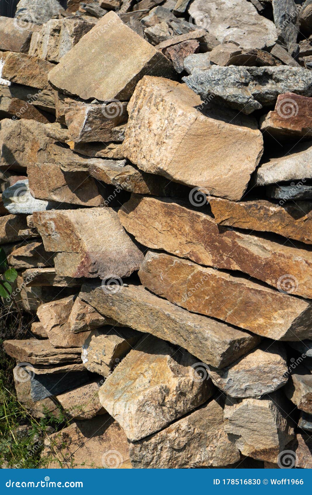 Stone Natural Flagstone Piled in a Pile. Natural Stone Flagstone, Laid in Uneven Rows