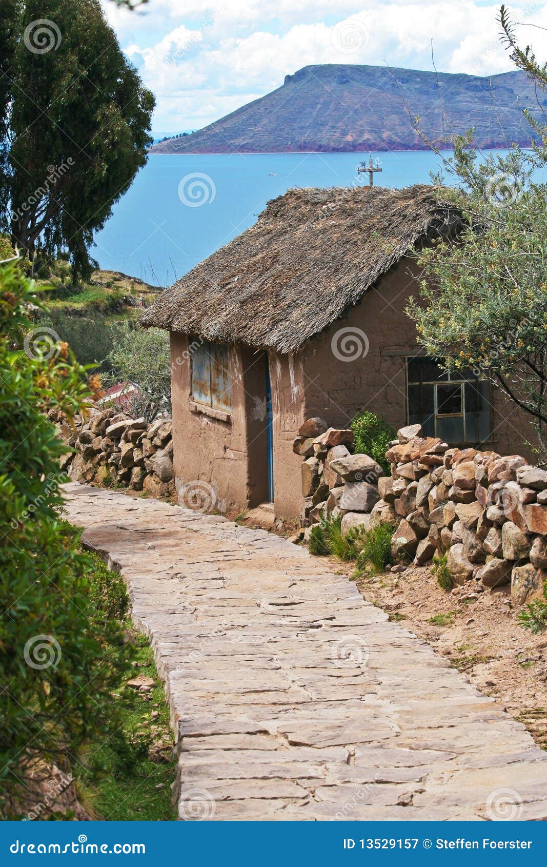 stone path on taquile island in lake titicaca, per