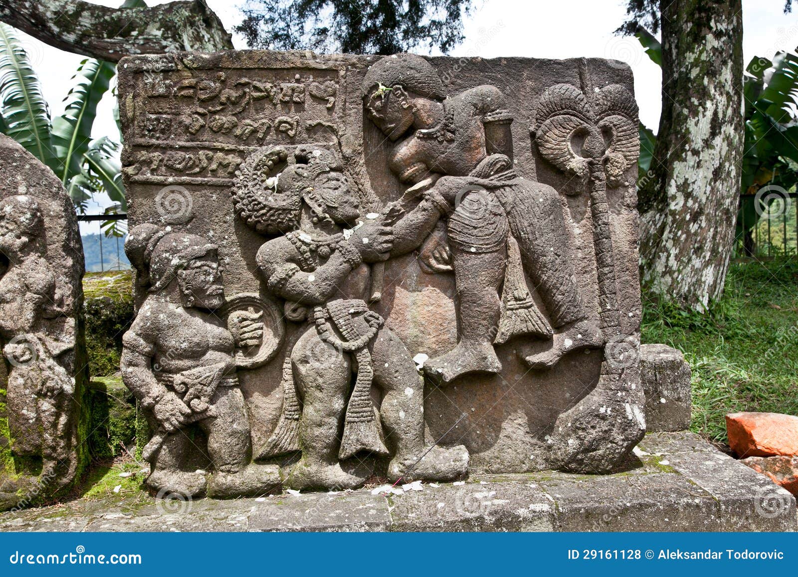 Stone Sculpture in Ancient Candi Sukuh on Java, Indonesia Stock Photo