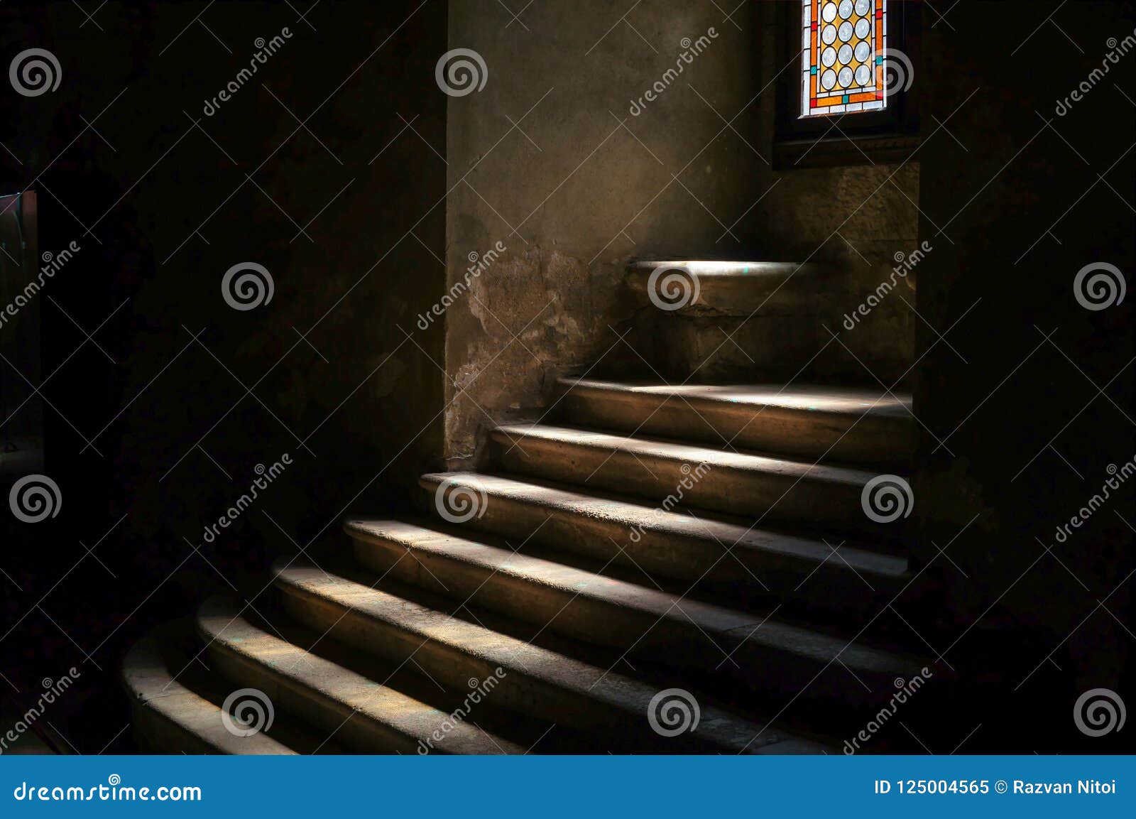 stone stairway in dark medieval castle dungeon