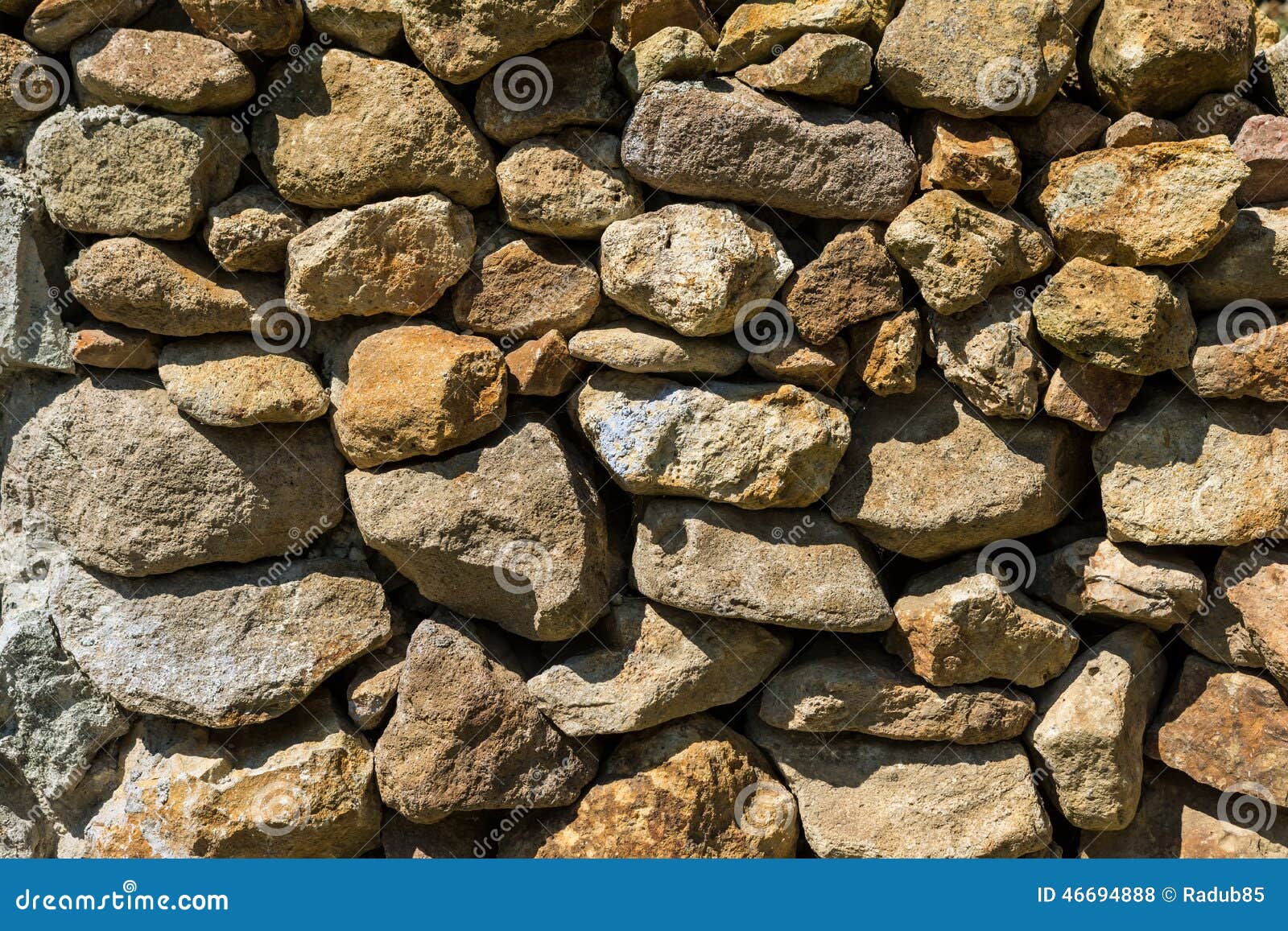 Stone Wall Made of Rocks stock photo. Image of home, brick 46694888