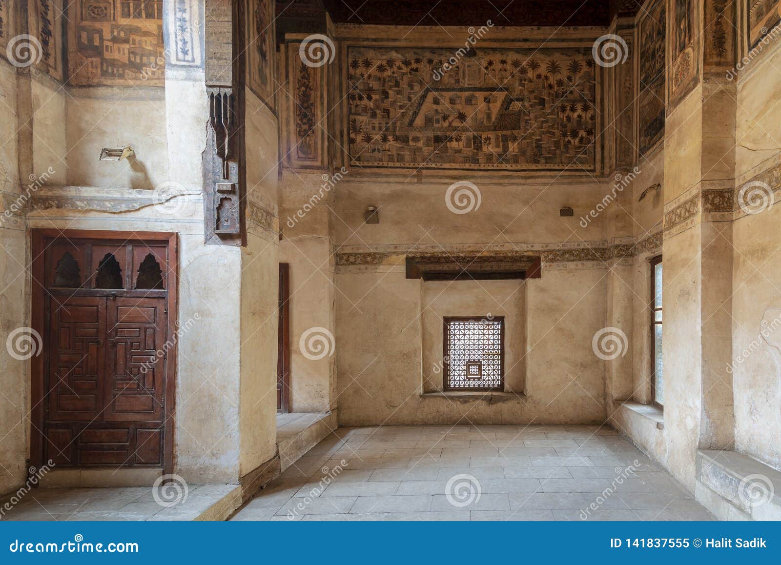 stone wall with wooden window mashrabiya at ottoman historic beit el set waseela building waseela hanem house, cairo, egypt