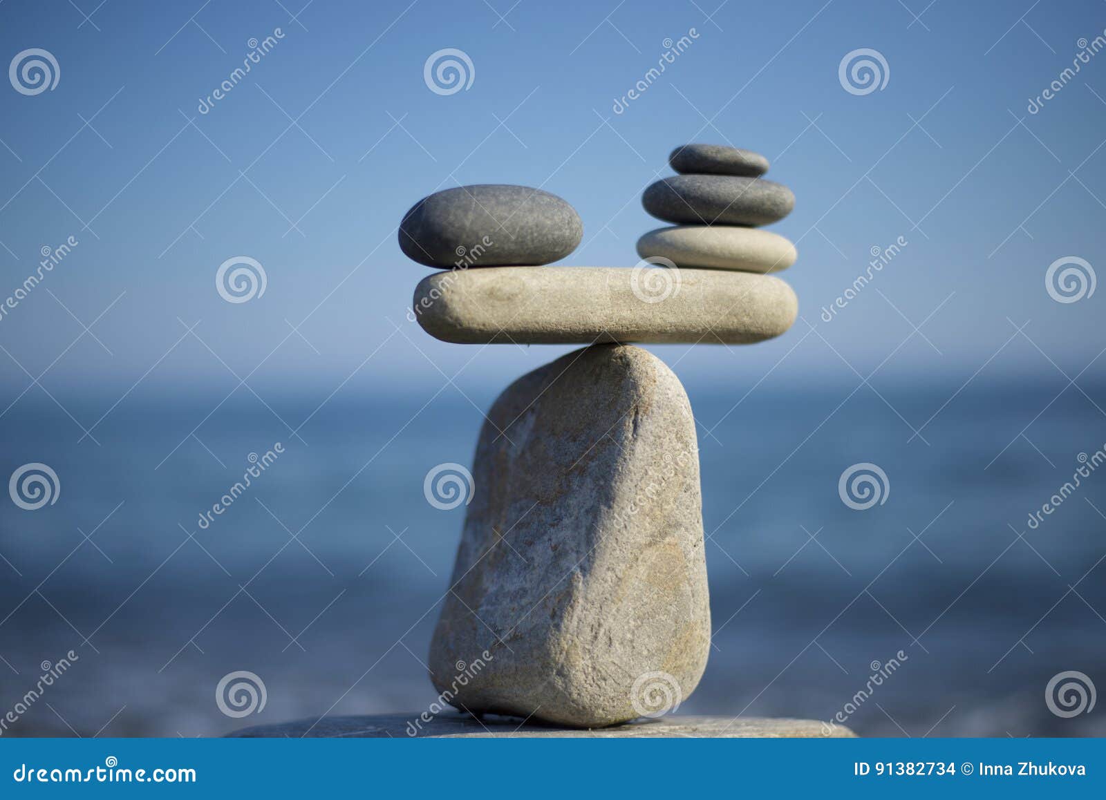 stones pile background. scales balance. balanced stones on the top of boulder. decide problem. to weight pros and cons.
