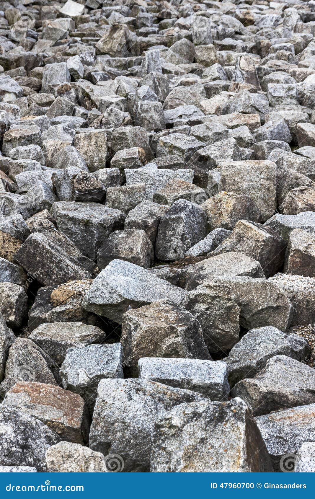 Stones. A stack of natural stone is located next to each other. representative photo