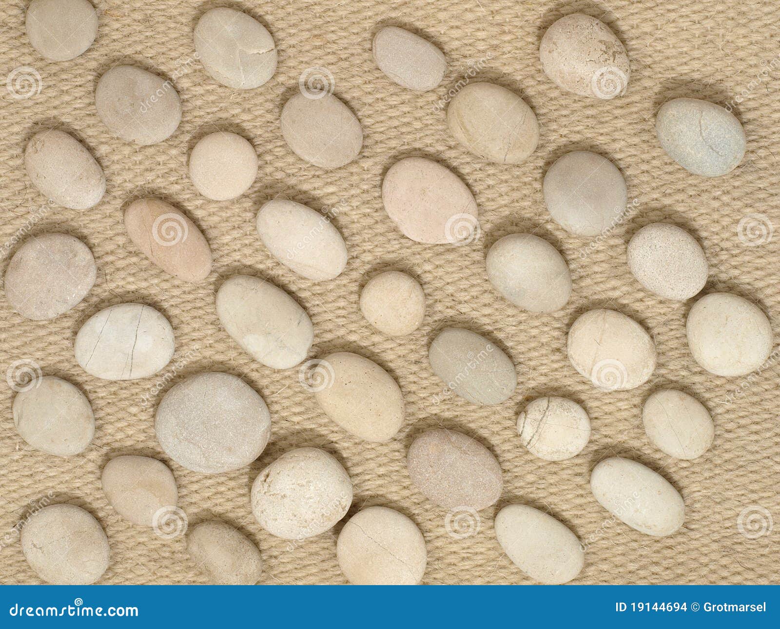 Stones on a wool fabric. stock photo. Image of decor 19144694