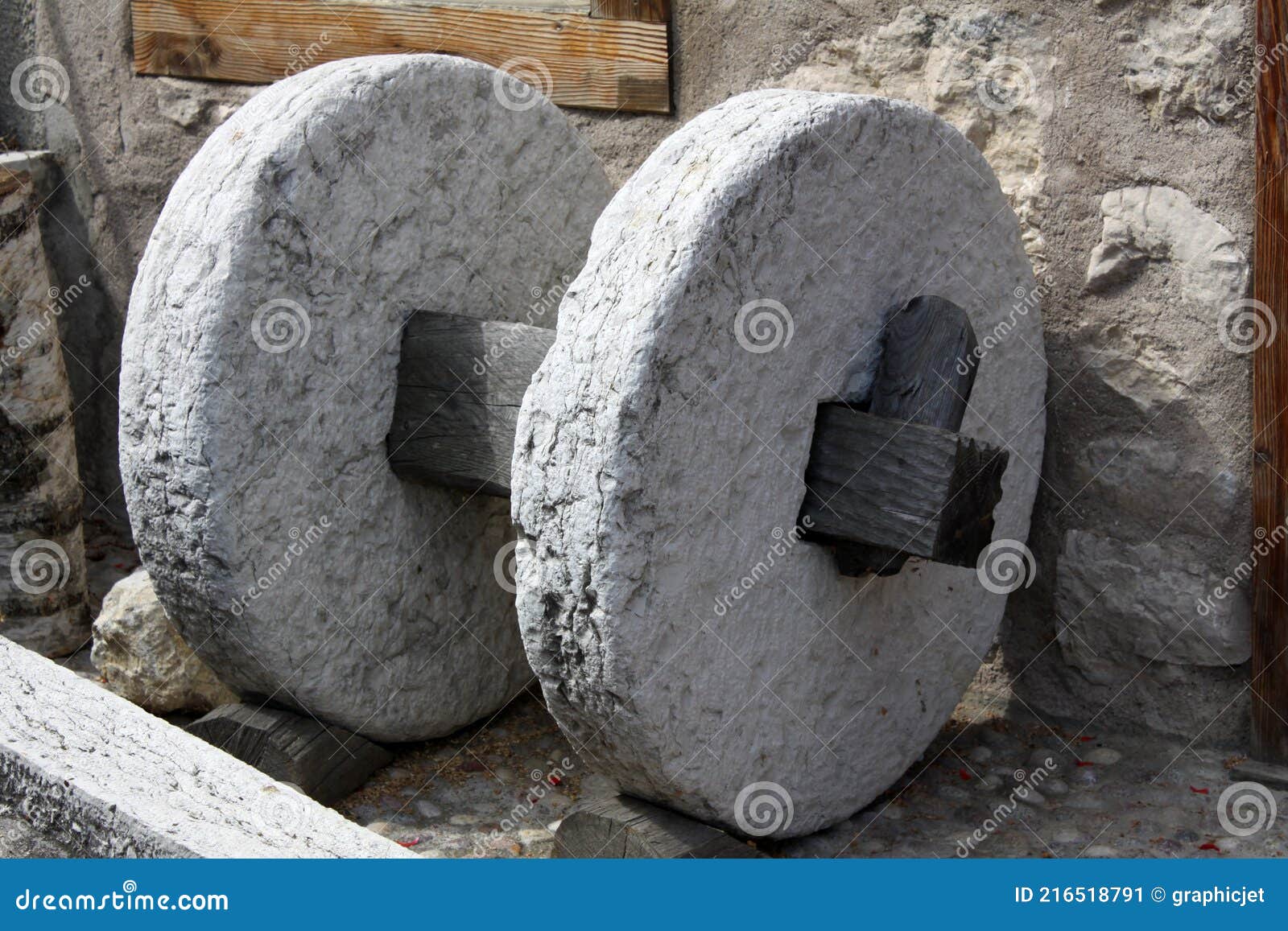stonewheel detail near a millstone in guardia, trentino, italy