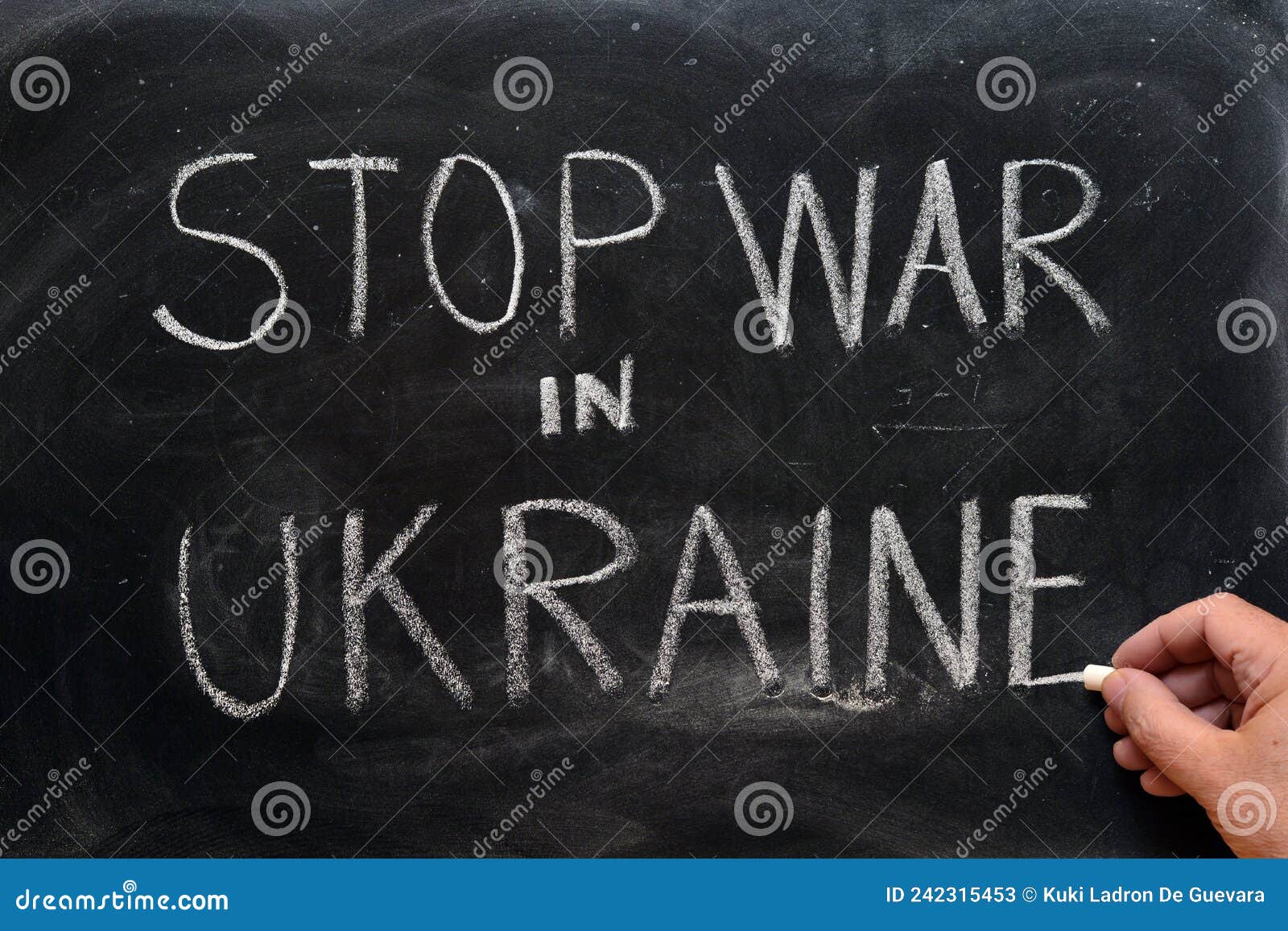 stop war in ukraine, written on a blackboard