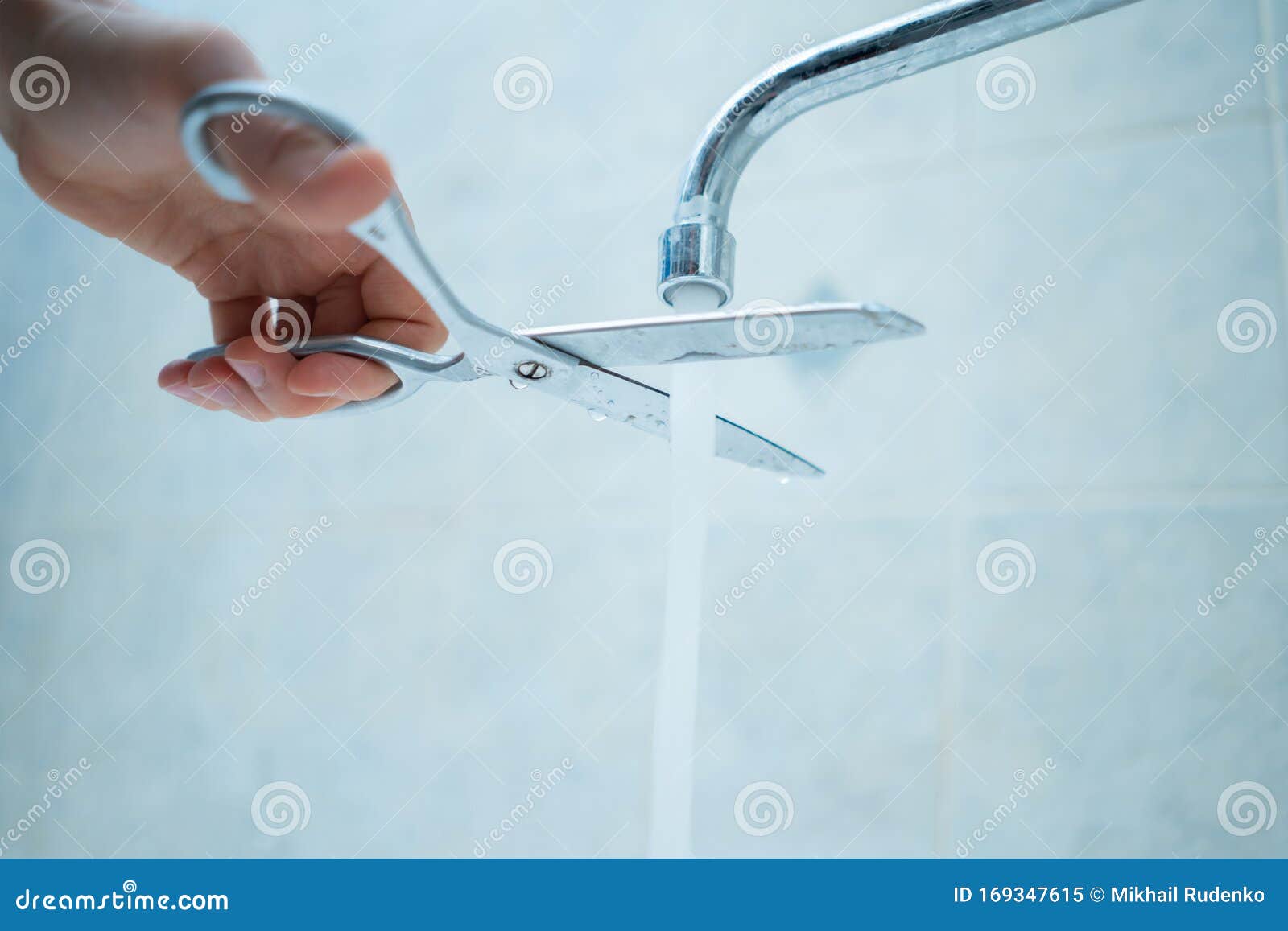 Stop Wasting the Pure Water, Hand with Scissors Cut the Water Stream