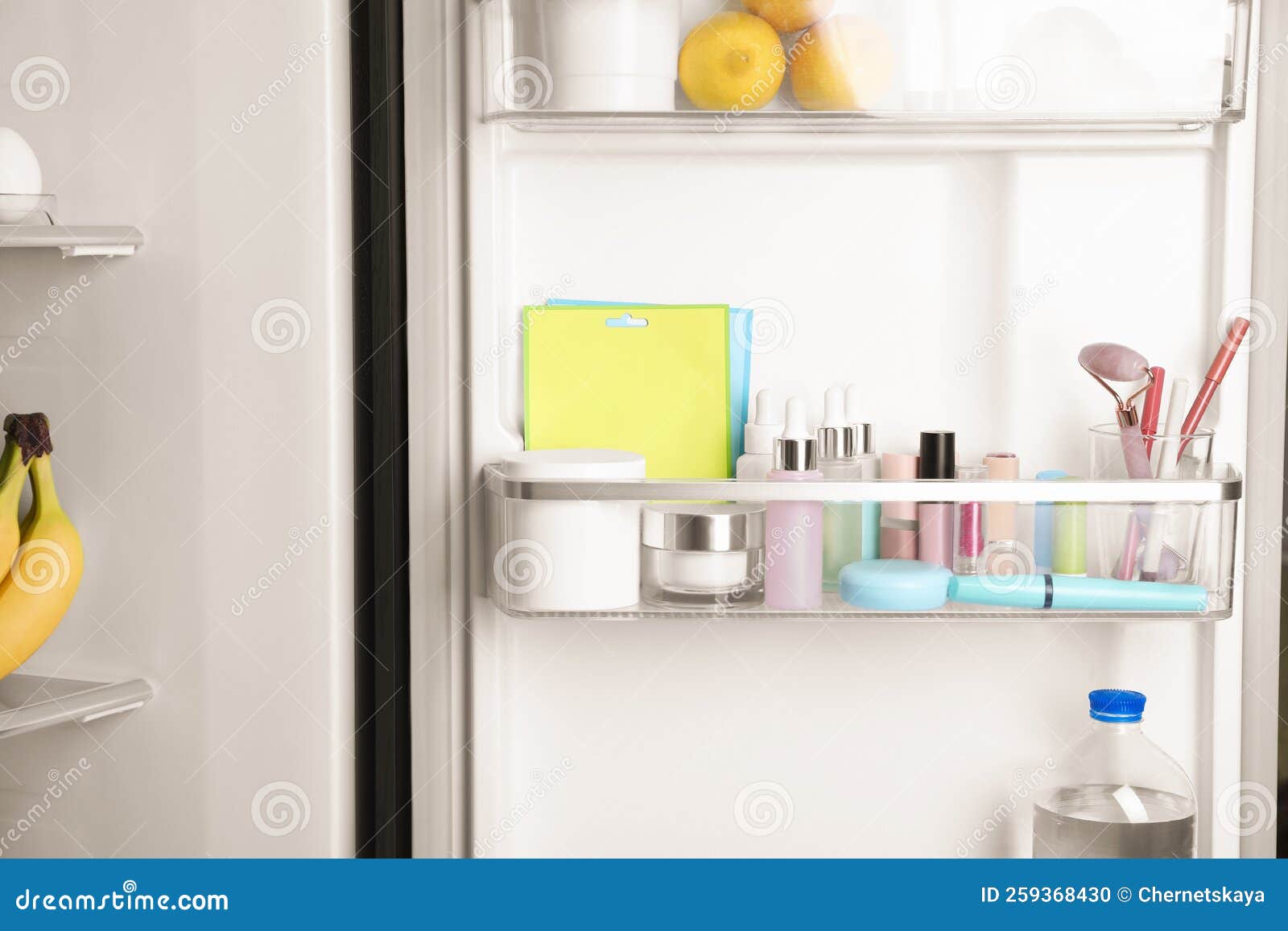 Storage of Cosmetics and Tools in Refrigerator Door Bin Stock Photo