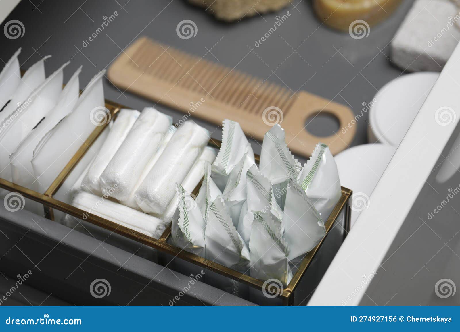 Storage of Different Feminine Hygiene Products in Drawer, Closeup Stock