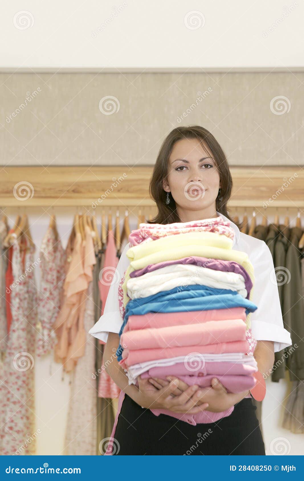 Store Attendant Holding Pile of Clothes Stock Photo Image of pile