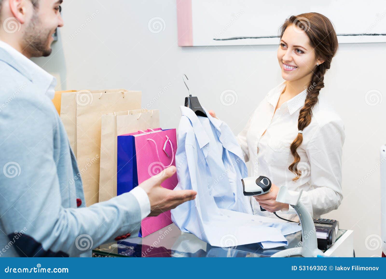store clerk serving purchaser