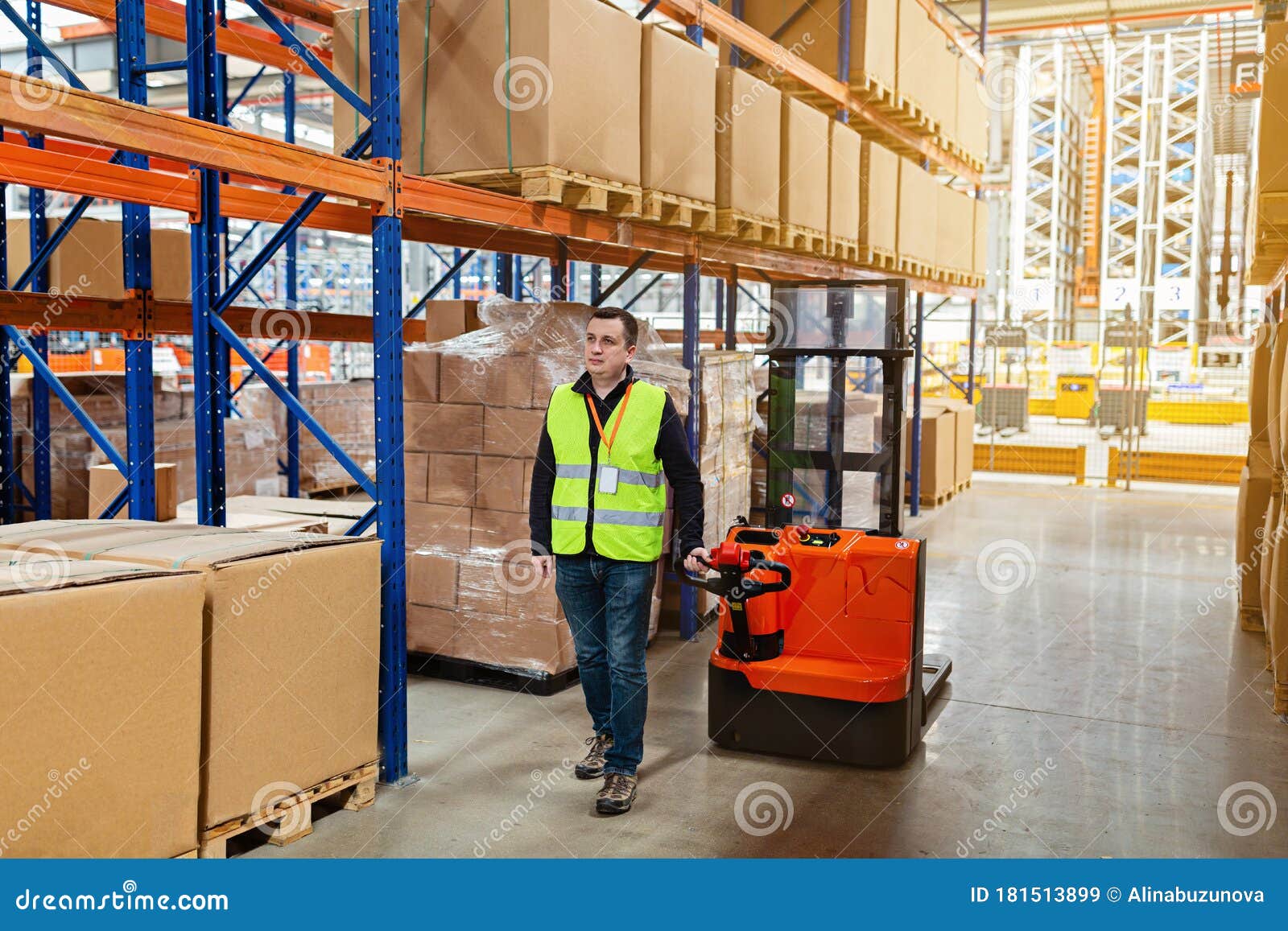 Storehouse Employee in Uniform Working on Forklift in Modern Automatic
