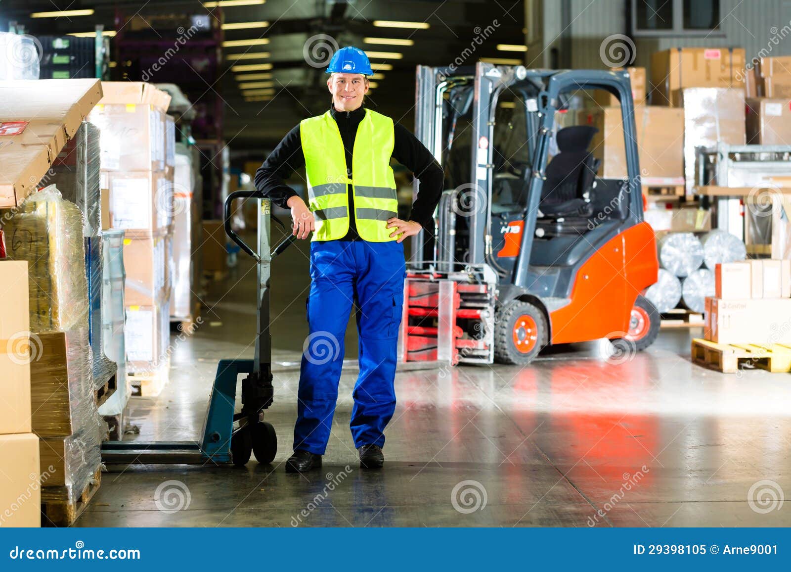 storeman with mover at warehouse of forwarding