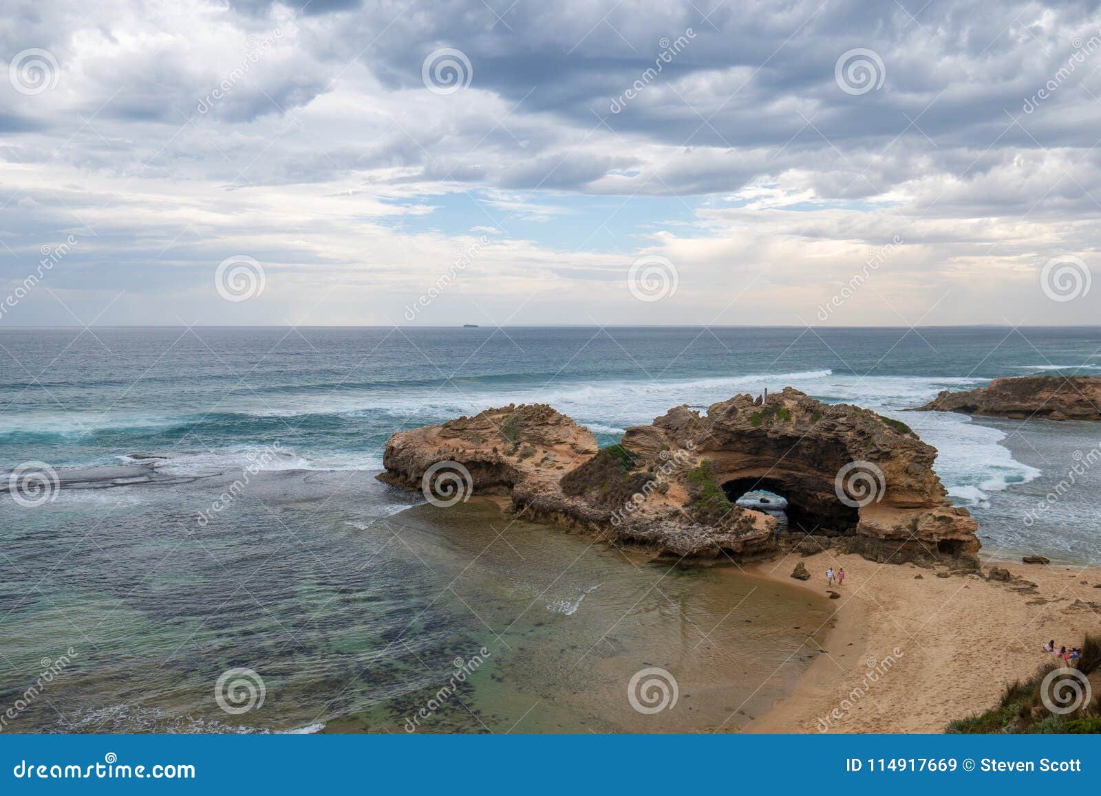 storm clouds gathering over london bridge at portsea, victoria,