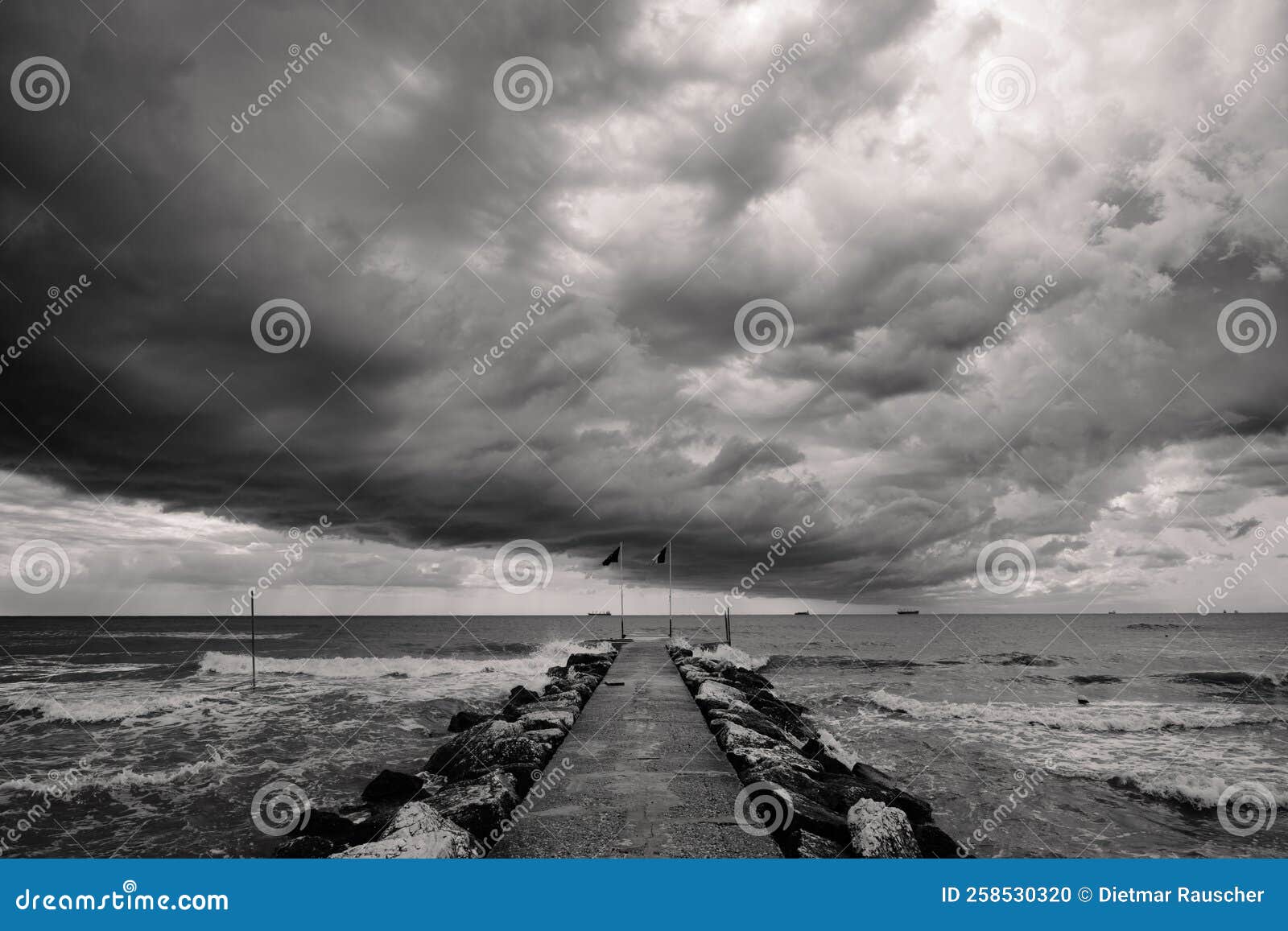 storm clouds on lido di venezia beach