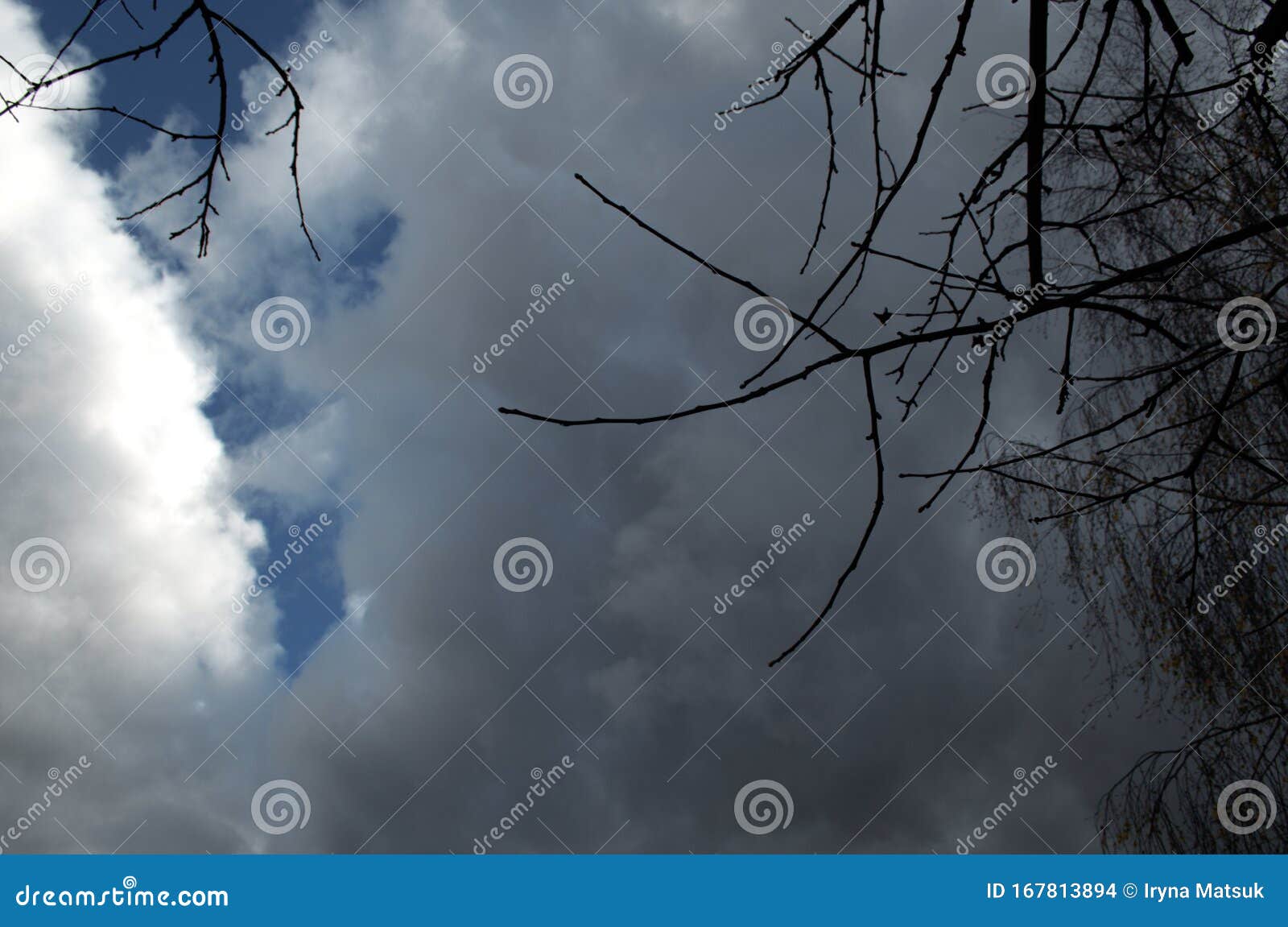 blue sky before a strong storm with black clouds