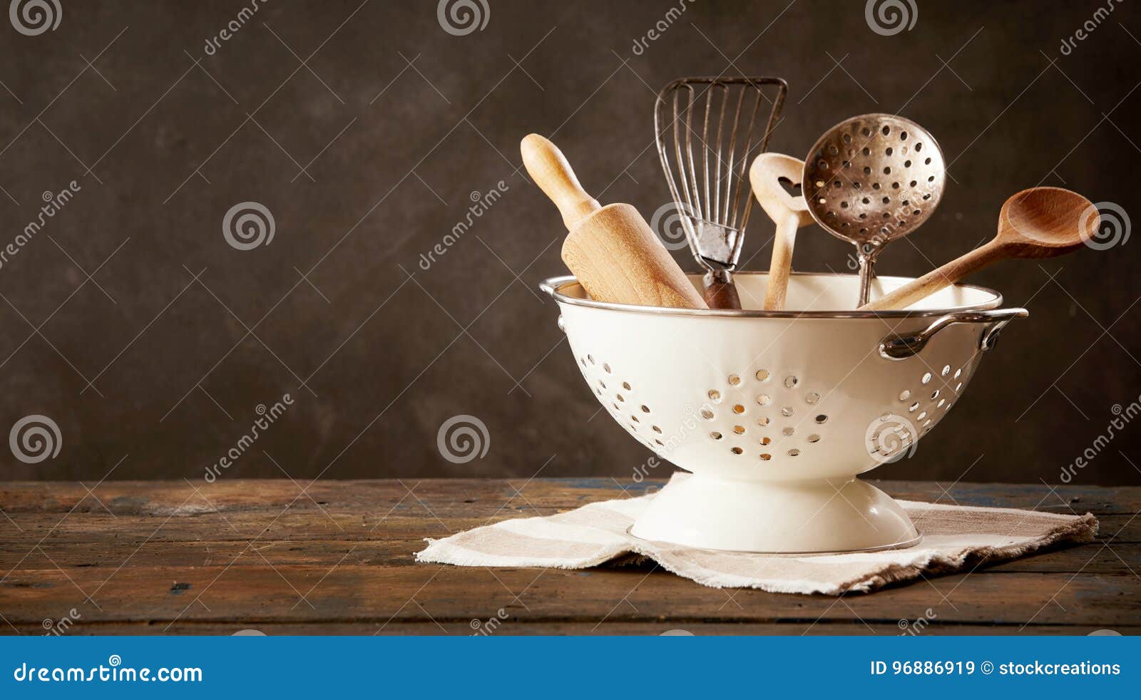 Strainer Full of Kitchen Utensils Stock Image Image of black, book