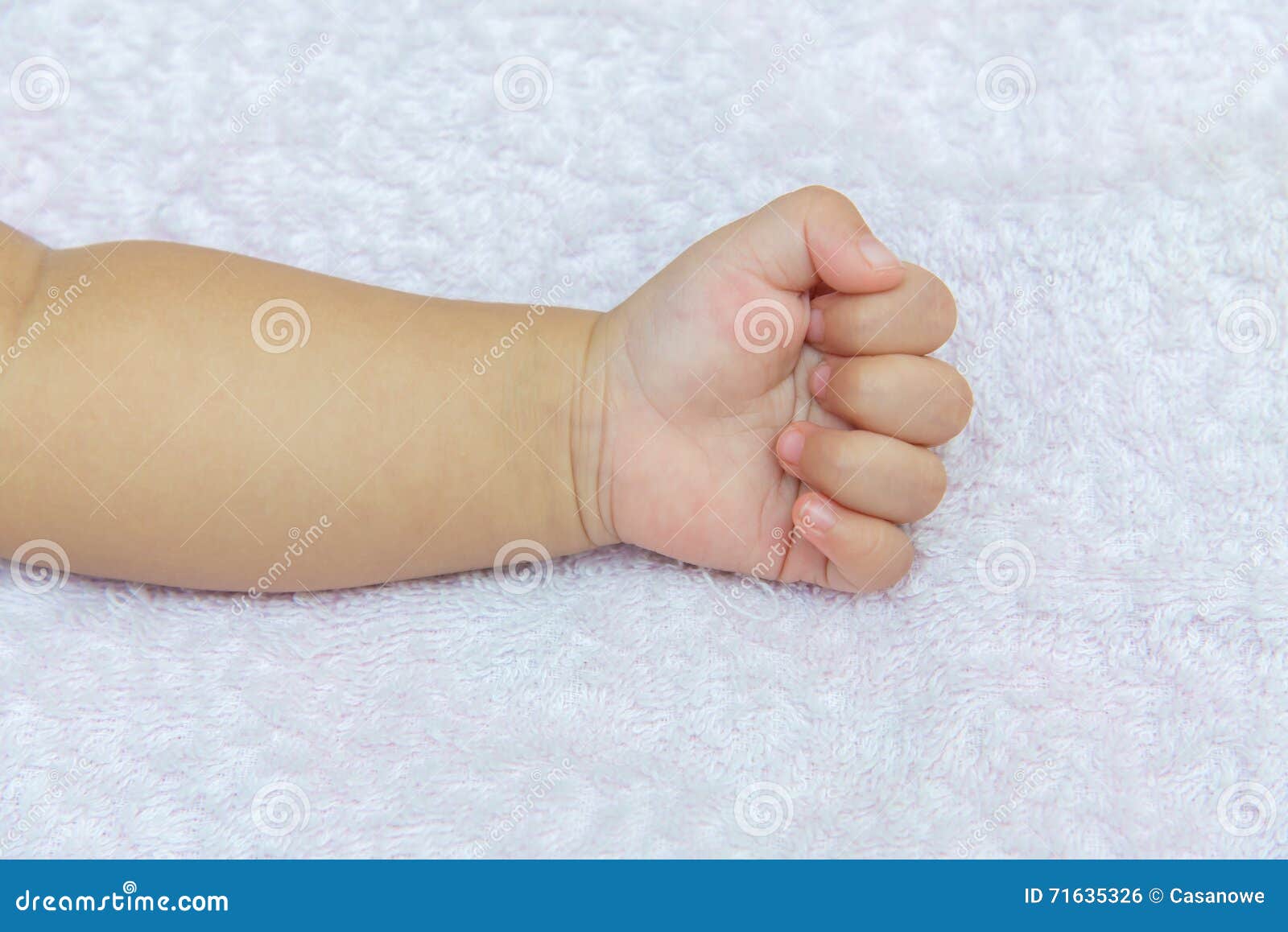 Stranglehold Hand of the Baby on White Diapers Stock Photo Image of