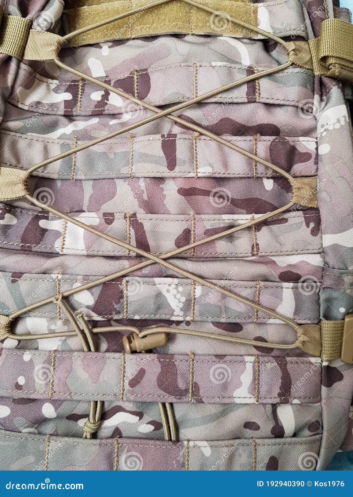 Straps and Buckles on the Tactical Camouflage Backpack Stock Photo