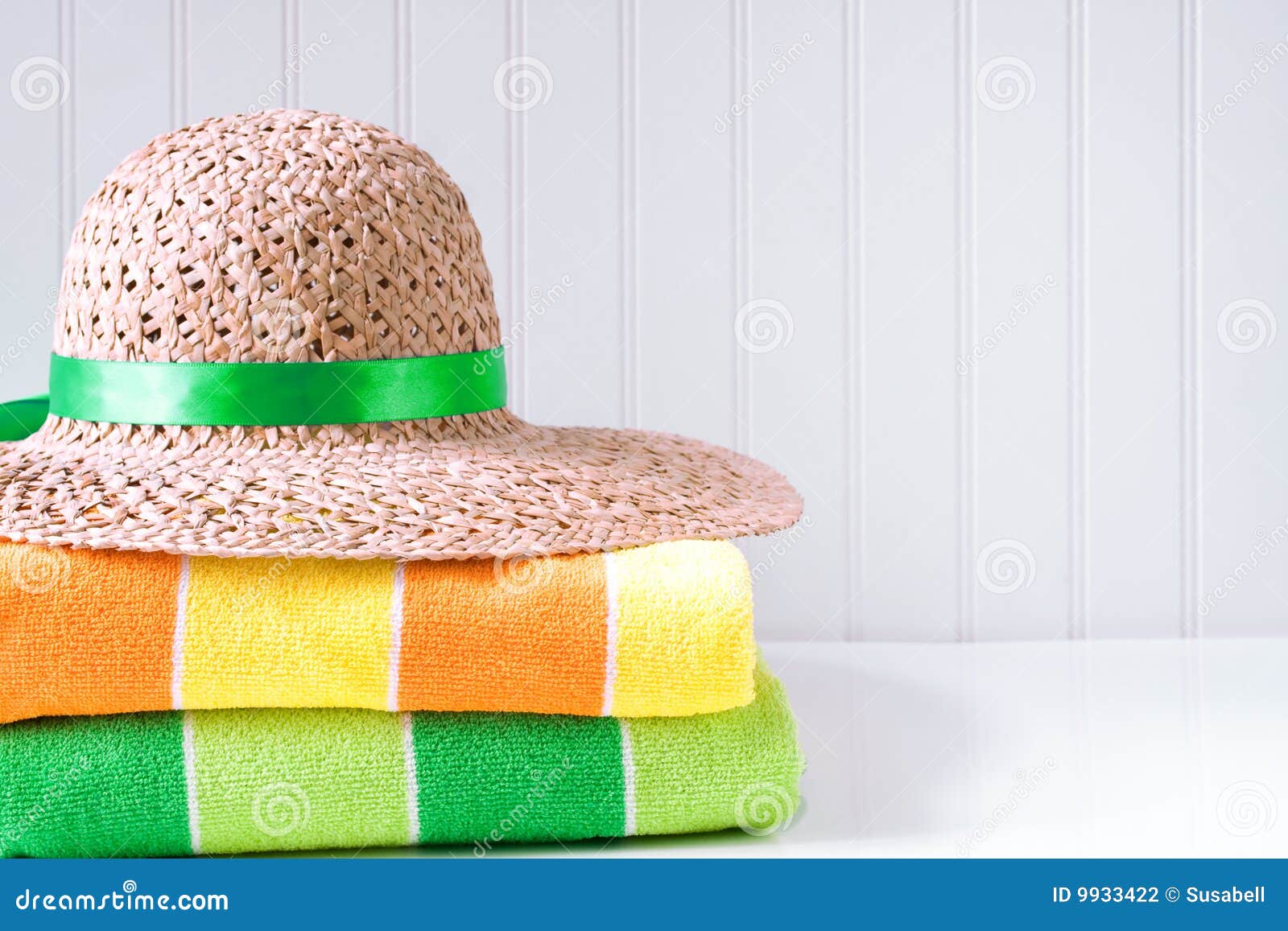 Straw Hat with Beach Towels Stock Photo Image of folded, colorful