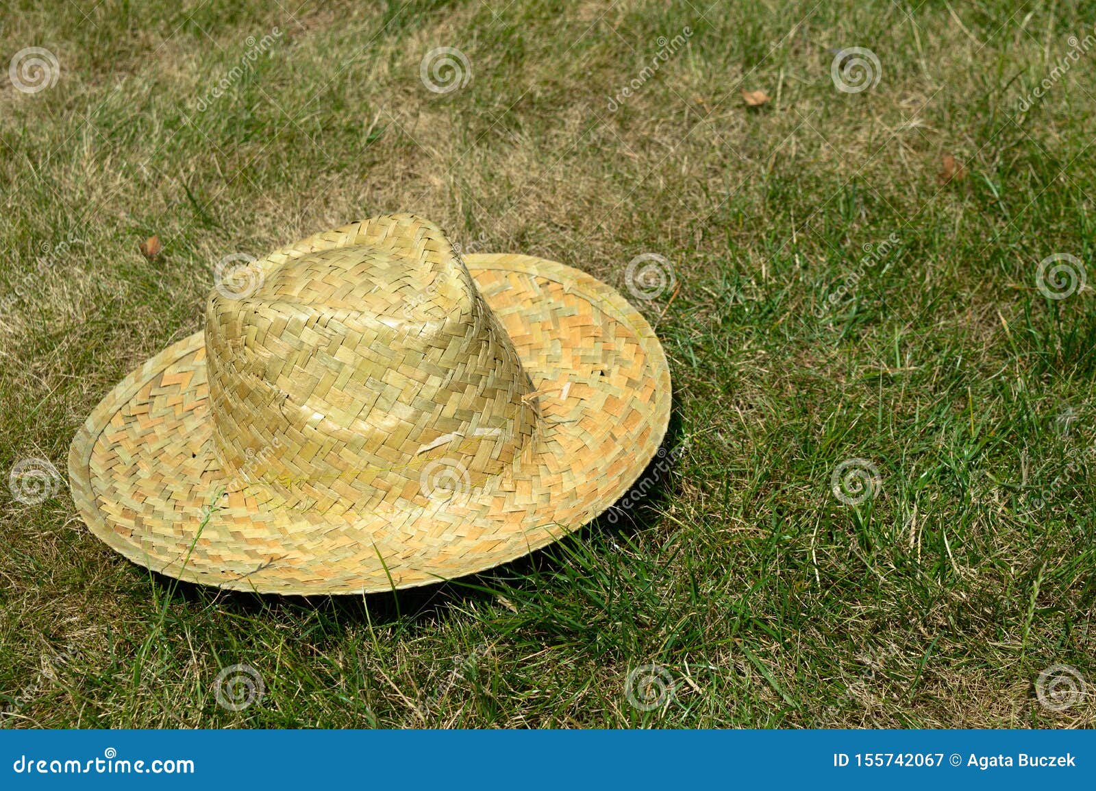 Straw hat on the grass stock image. Image of brown, outdoor - 155742067