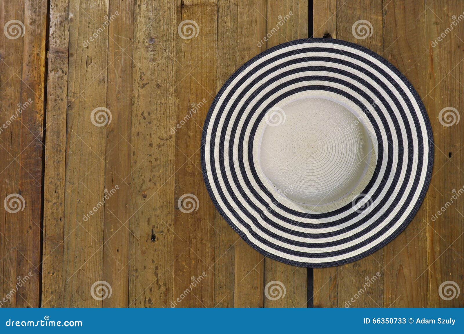 Straw hat on a table stock image. Image of wood, background - 66350733