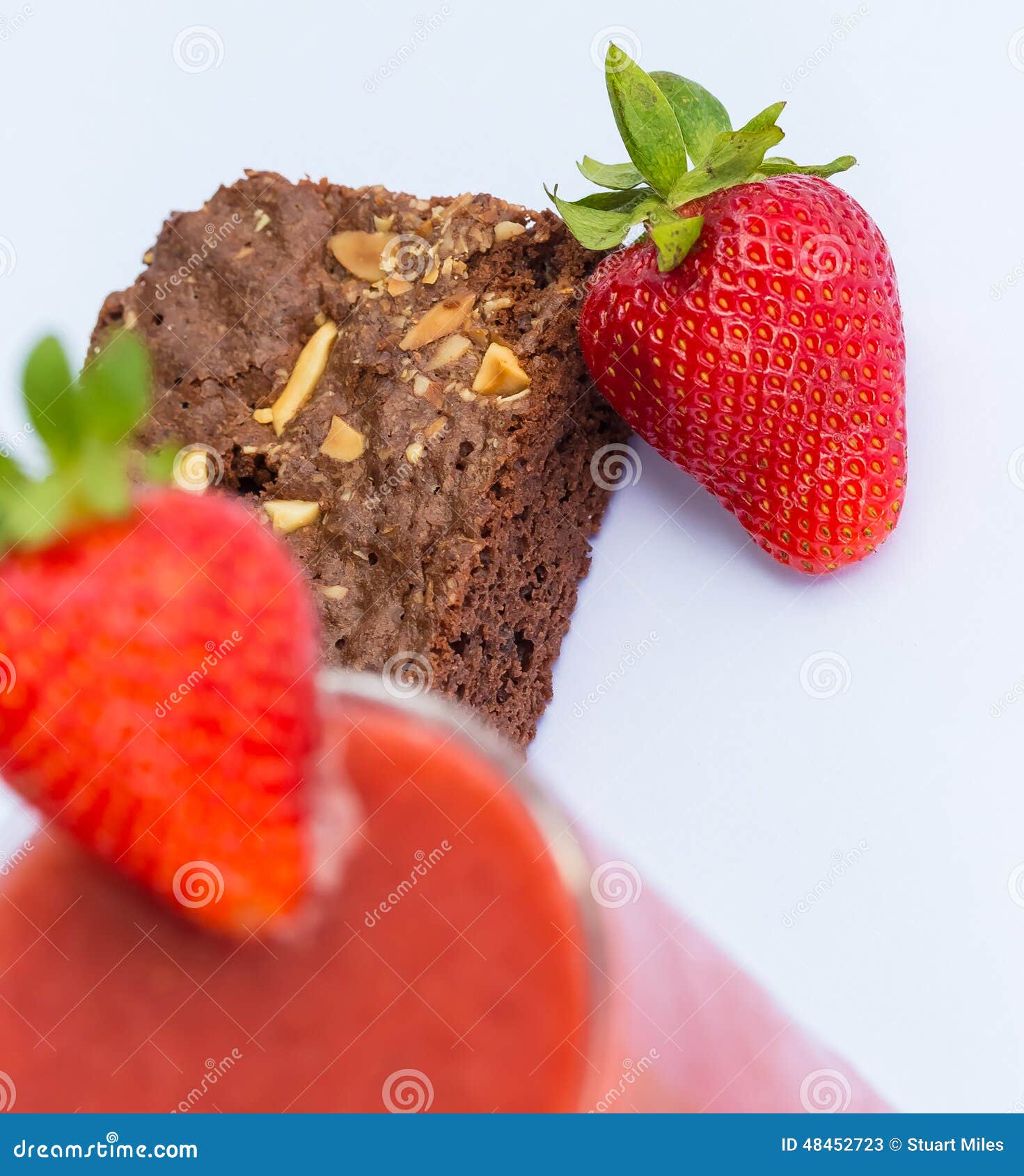 strawberries and brownie indicates juicy afters and fruity