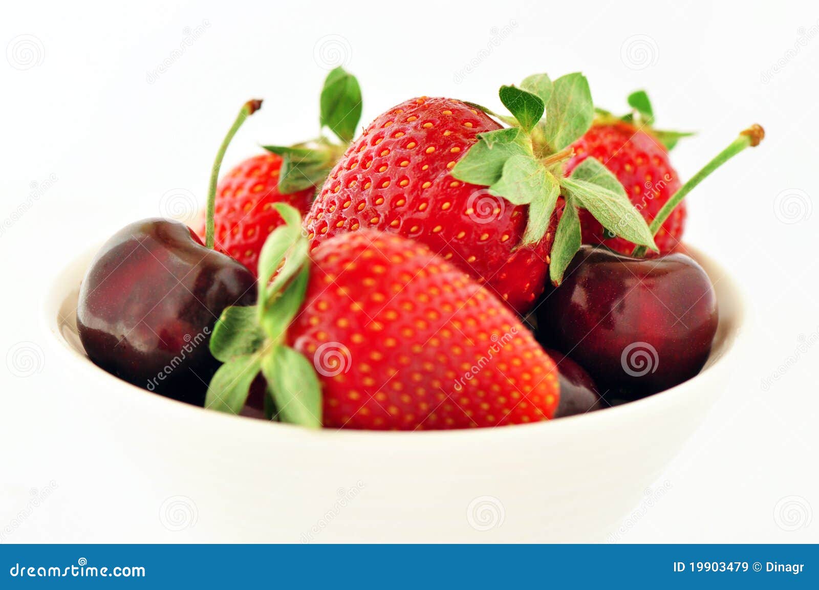 Strawberries and cherries stock image. Image of bowl 19903479