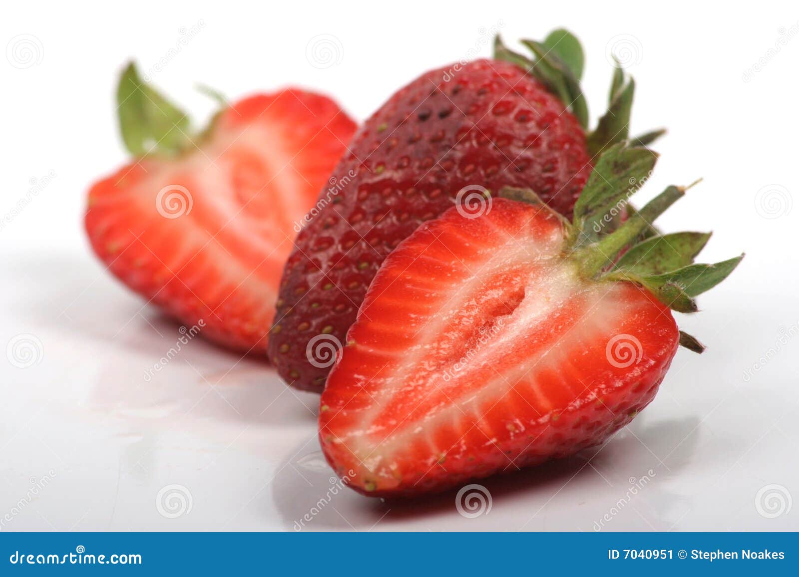Strawberries cut in half stock image. Image of orange 7040951