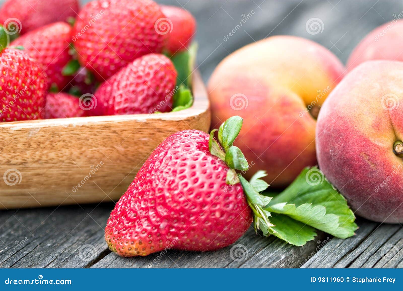 Strawberries and peaches stock photo. Image of juicy, grey 9811960