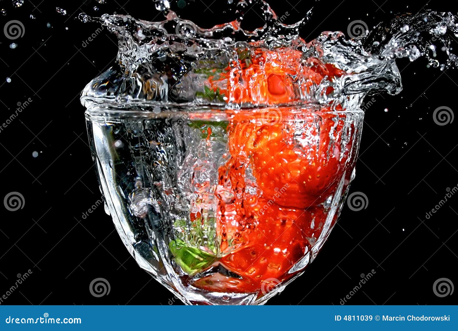 strawberries splashed in water
