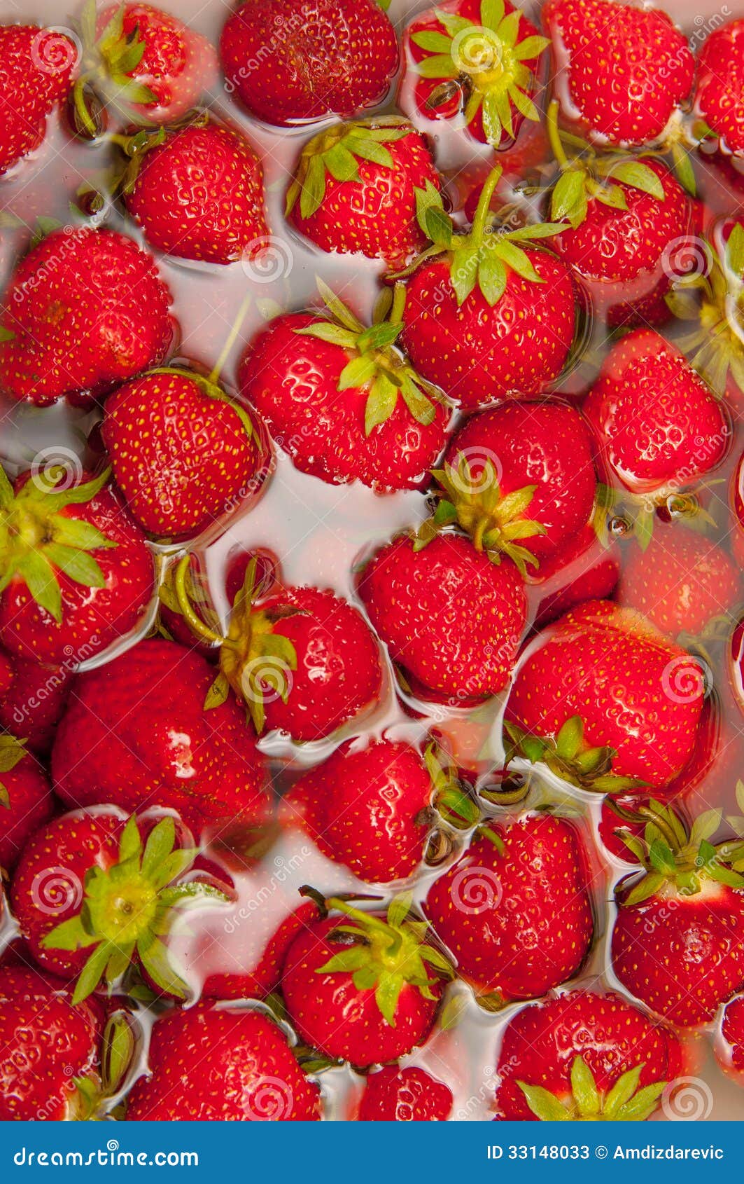 Strawberries in water stock image. Image of seeds, freshness 33148033