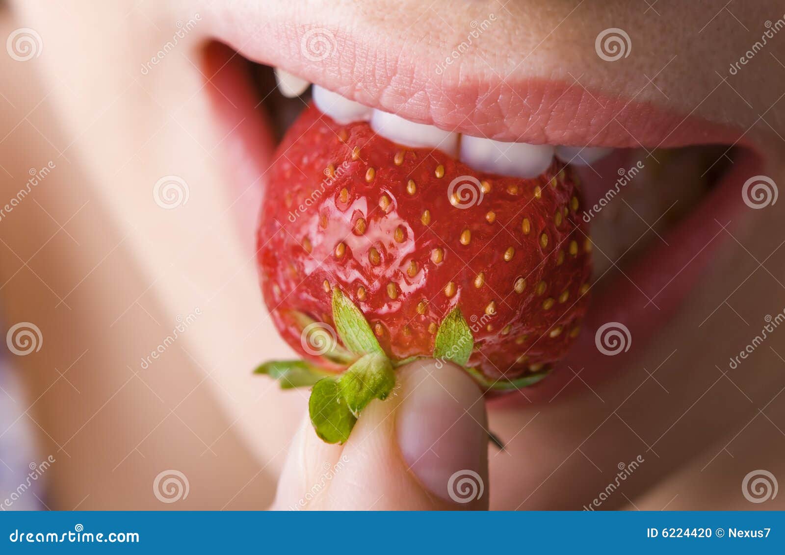 Strawberry Bite stock photo. Image of juicy, bite, lips 6224420