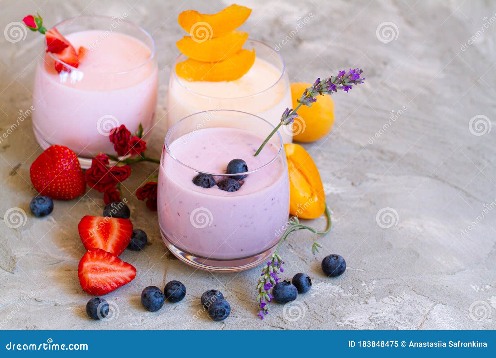 strawberry, blueberry smoothie on light background. well being and weight loos concept. milkshake with fresh berries. healthy