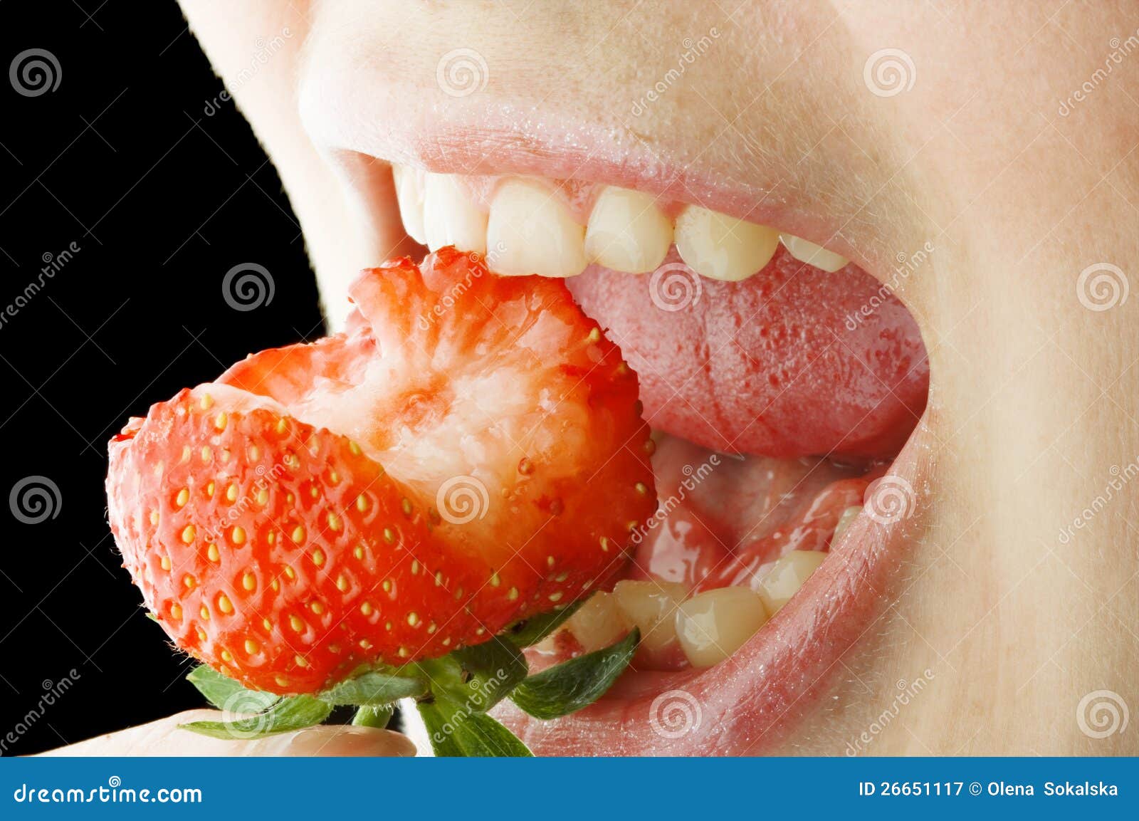 Strawberry in lips stock image. Image of clean, human 26651117
