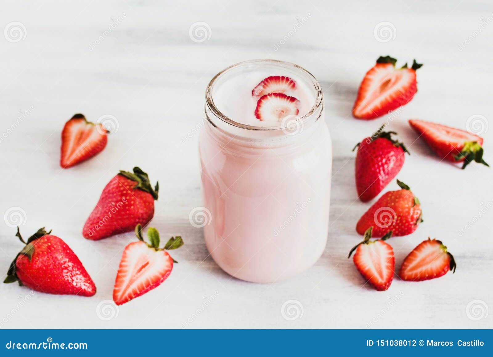 strawberry milkshake in the glass jar white background