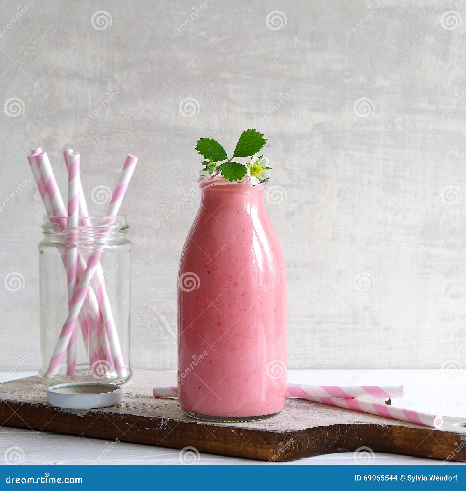 Download Strawberry Smoothie In A Glass Bottle With Strawberry Flower Stock Photo Image Of Milk Berries 69965544 Yellowimages Mockups