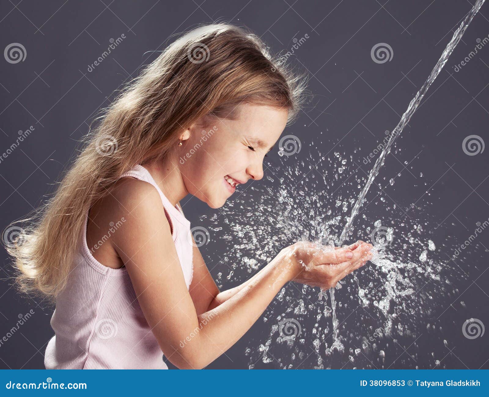 Stream Of Clean Water Pouring Into Children's Hands Stock Photos