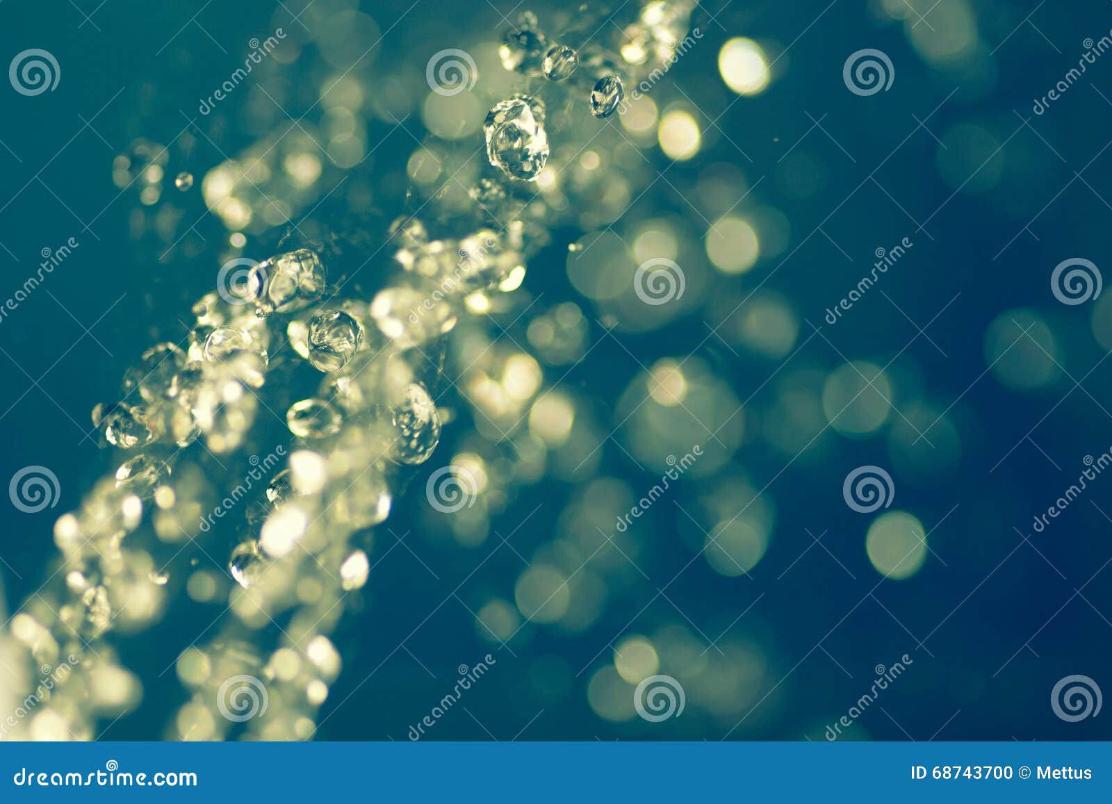 Stream of Water Levitating. Hovering Water. Flying Raindrops. Selective