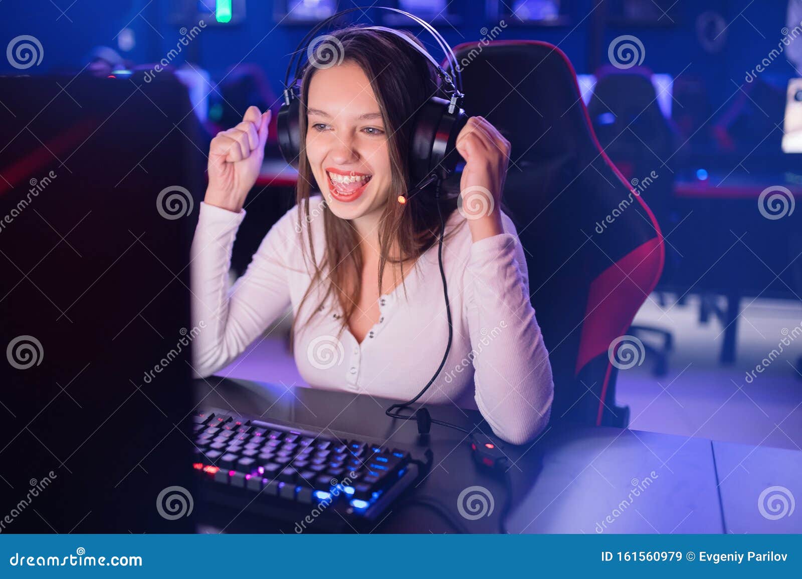 Streamer Beautiful Girl Professional Gamer Smile Playing Online Games Computer With Headphones 