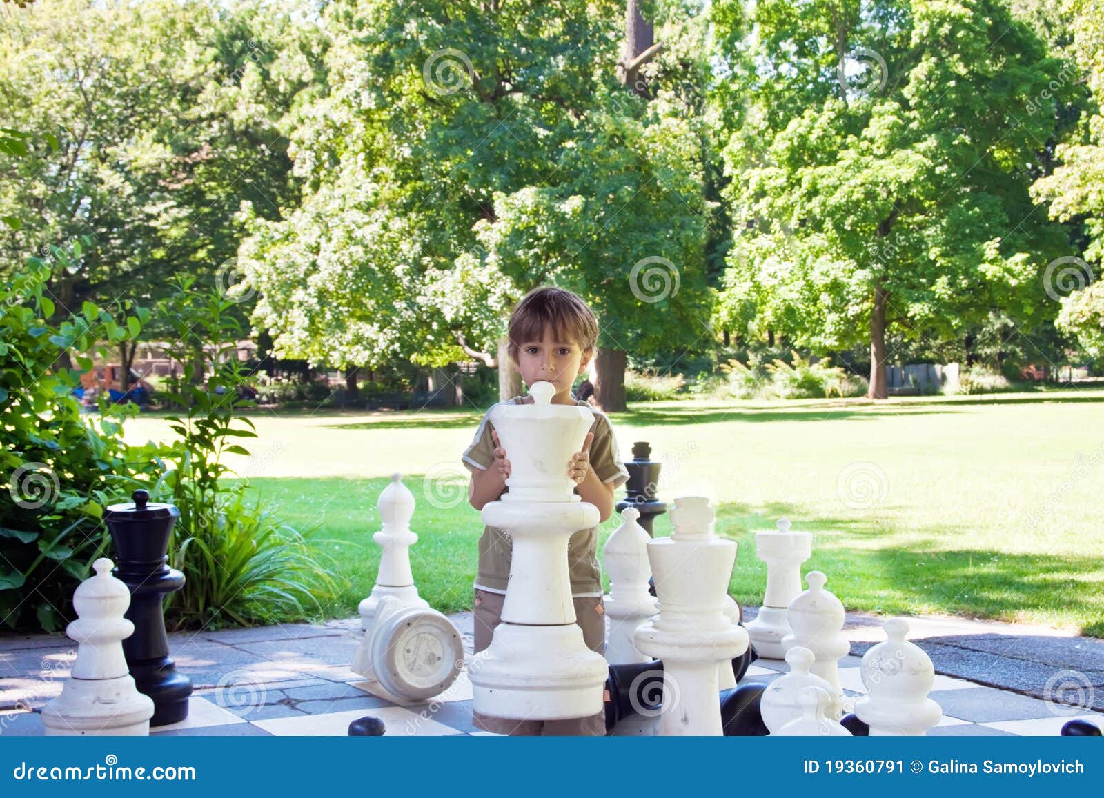 Children playing chess game on street with large size chess pieces and chess  board on street of Mile End in Le Plateau Mont Royal.Montreal.Quebec.Canada  Stock Photo - Alamy