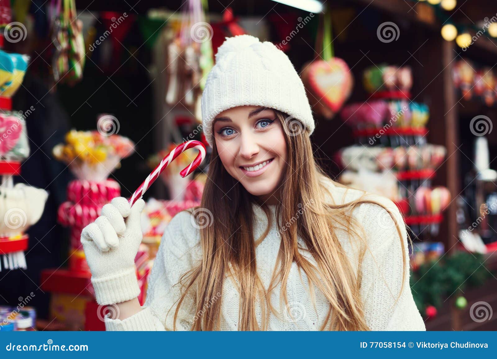 Street Fashion Portrait of Smiling Beautiful Young Woman Holding Candy ...