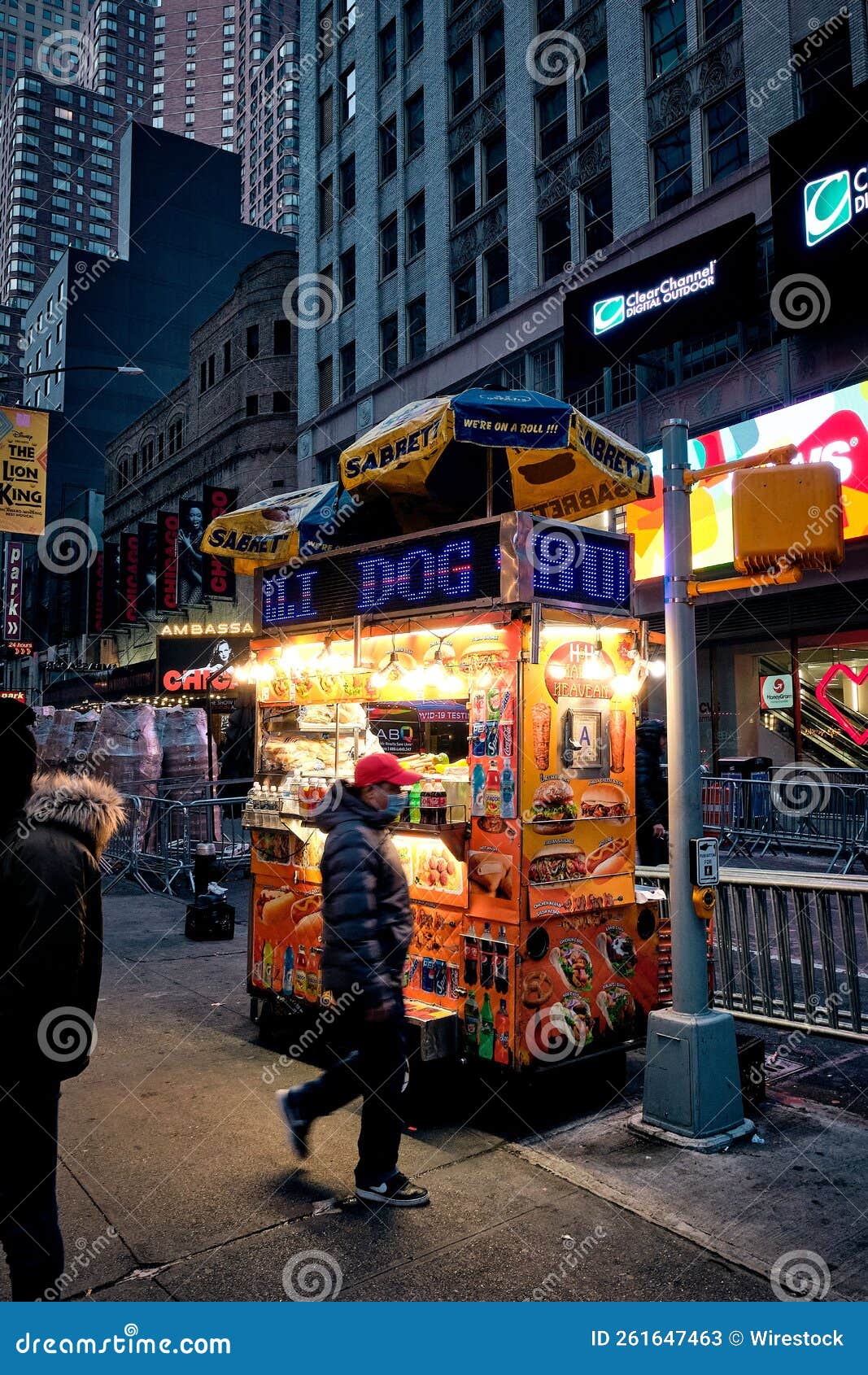 Street Food Cart in Times Square, New York, USA at Night Editorial