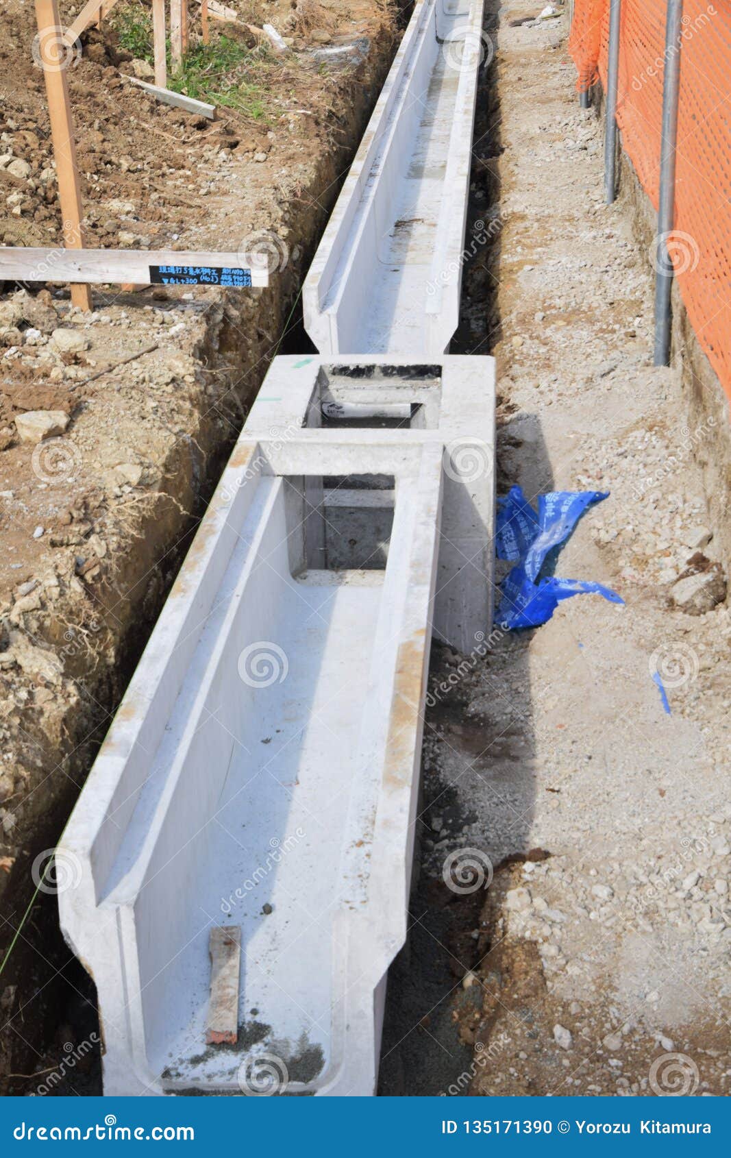 Street gutter construction stock photo. Image of concrete 135171390